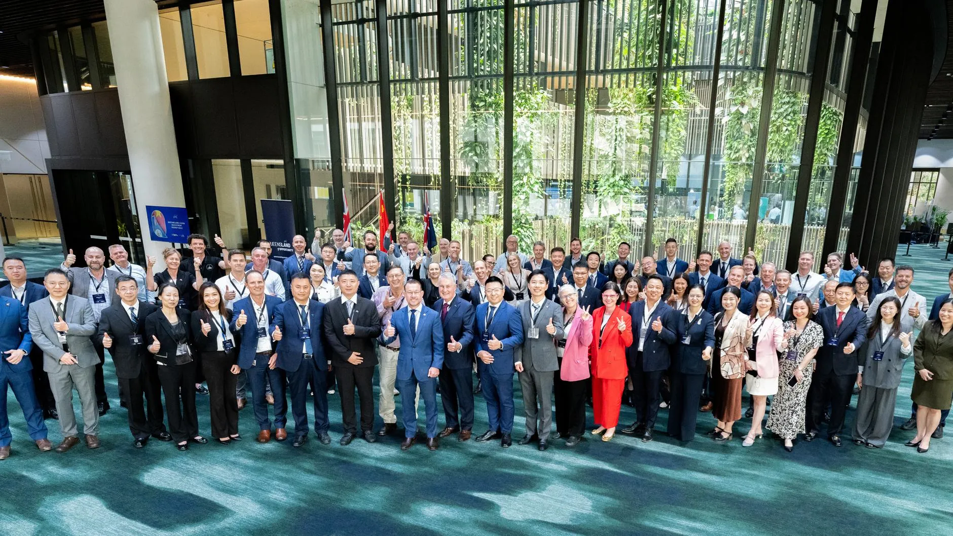 Group photo of attendees at the Queensland Network Industry Summit in Brisbane