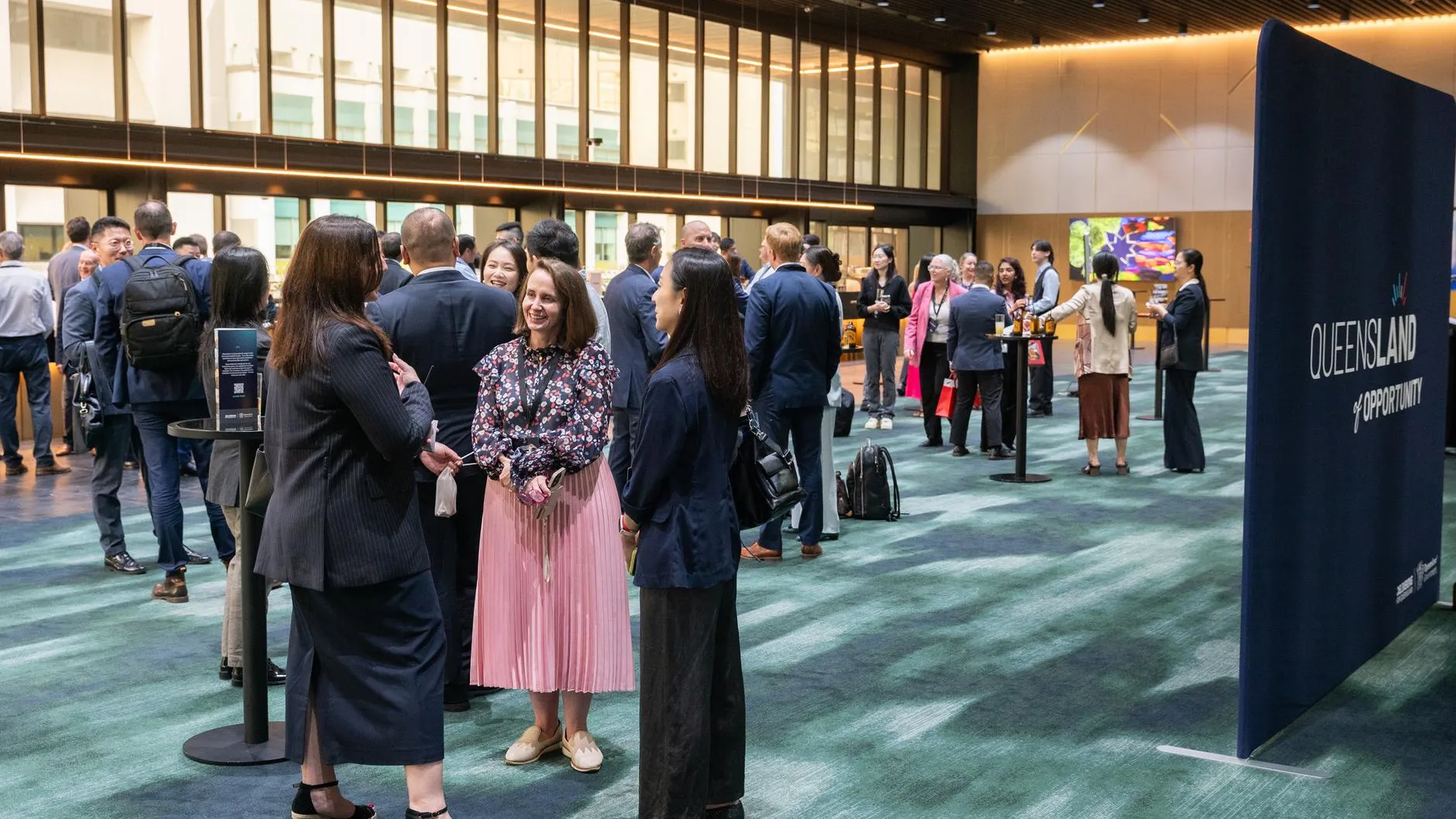 Delegates networking at the summit venue in Brisbane